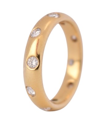 Lot 64 - 18CT GOLD & DIAMOND ETERNITY RING