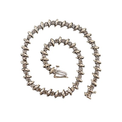 Lot 218 - HALLMARKED 14CT WHITE GOLD & DIAMOND LINE BRACELET