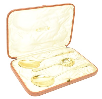 Lot 75 - CASED SET OF THREE GEORGE III GILT HALLMARKED SILVER SERVING SPOONS
