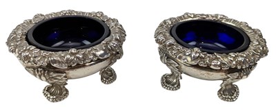 Lot 17 - PAIR OF GEORGE IV HALLMARKED SILVER & BLUE GLASS LINED TABLE SALTS