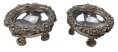 Lot 17 - PAIR OF GEORGE IV HALLMARKED SILVER & BLUE GLASS LINED TABLE SALTS