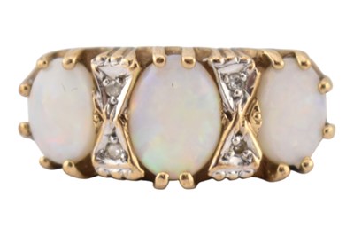 Lot 363 - GOLD OPAL & DIAMOND THREE-STONE RING