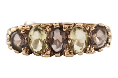Lot 328 - GOLD SMOKY QUARTZ & CITRINE FIVE STONE RING