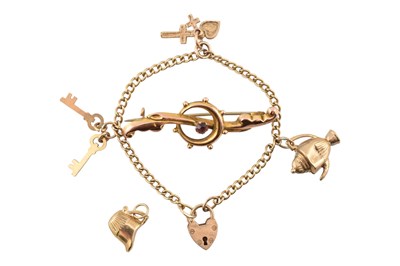 Lot 253 - HALLMARKED 9CT GOLD CHARM BRACELET & A YELLOW METAL BROOCH PIN