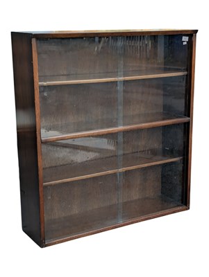 Lot 601 - BRITISH MODERN DESIGN - MID CENTURY TEAK GLAZED BOOKCASE