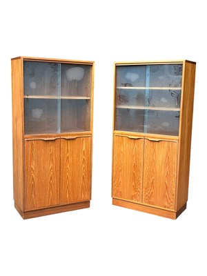 Lot 653 - BRITISH MODERN DESIGN - PAIR OF MATCHING TEAK LIBRARY BOOKCASES