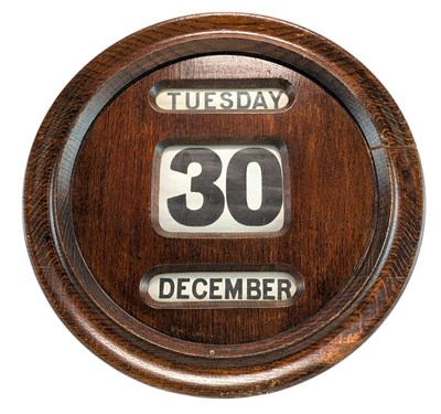 Lot 246 - EARLY 20TH CENTURY ART DECO OAK PERPETUAL WALL CALENDAR