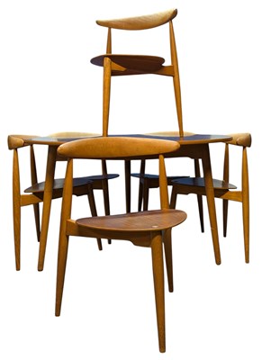 Lot 300 - HANS WEGNER (DANISH 1914-2007) FOR FRITZ HANSEN - MID CENTURY DINING SUITE