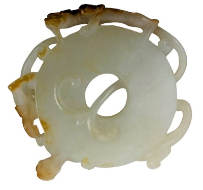 Lot 90 - CHINESE WHITE JADE WITH RUSSET SKIN CARVING 'BI' DISC WITH CHILONG 和田螭龙玉璧