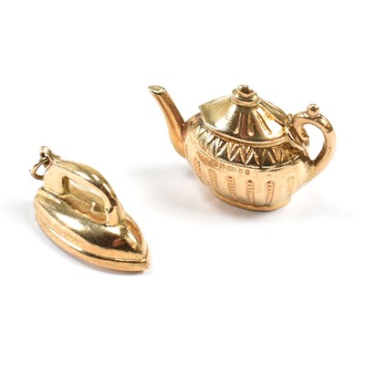 Lot 76 - TWO HALLMARKED 9CT GOLD CHARMS IRON & TEAPOT
