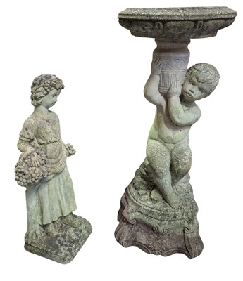 Lot 557 - RECONSTITUTED STONE CHRUB BIRD BATH AND YOUNG GRAPE GIRL