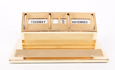 Lot 260 - MID CENTURY GILT METAL PERPETUAL CALENDAR