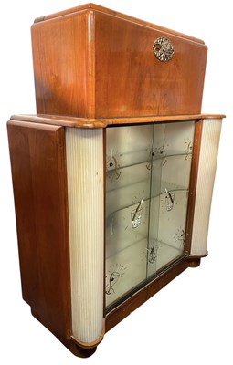 Lot 584 - HAVAN - MID CENTURY 1950S WALNUT & GLASS COCKTAIL CABINET