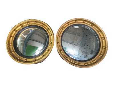 Lot 784 - PAIR OF VINTAGE REGENCY STLE GILTWOOD CONVEX MIRRORS