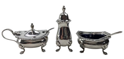 Lot 107 - ELIZABETH II 3PC HALLMARKED SILVER & BLUE GLASS LINED CRUET SET