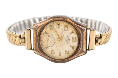 Lot 409 - HALLMARKED 9CT GOLD CASED PERFECTA WATCH ON METAL FLEX STRAP