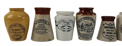 Lot 201 - VINTAGE ADVERTISING. COLLECTION OF FIFTEEN STONEWARE CREAM JUGS, NAMED