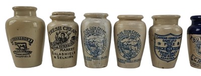 Lot 214 - COLLECTION OF 15 STONEWARE CREAM JUGS, NAMED
