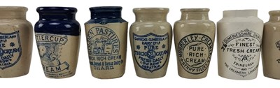 Lot 214 - COLLECTION OF 15 STONEWARE CREAM JUGS, NAMED