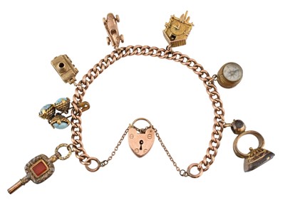 Lot 101 - 9CT GOLD CHARM BRACELET WITH GOLD & METAL CHARMS
