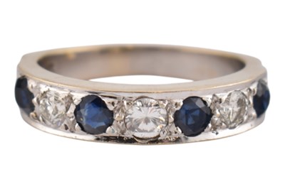 Lot 104 - 18CT GOLD SAPPHIRE & DIAMOND HALF HOOP RING