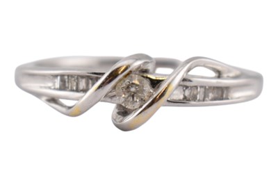 Lot 388 - DIAMOND CROSSOVER RING