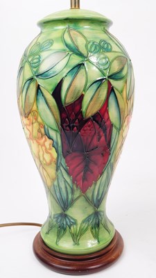 Lot 81 - MOORCROFT POTTERY - TWO ' RAINFOREST ' DESIGN CERAMIC LAMP & PLATE
