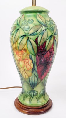 Lot 81 - MOORCROFT POTTERY - TWO ' RAINFOREST ' DESIGN CERAMIC LAMP & PLATE