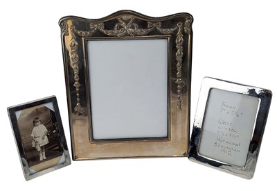 Lot 87 - THREE EARLY 20TH CENTURY HALLMARKED SILVER PHOTO FRAMES