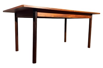 Lot 502 - MID CENTURY DANISH-INFLUENCED TEAK EXTENDING DINING TABLE
