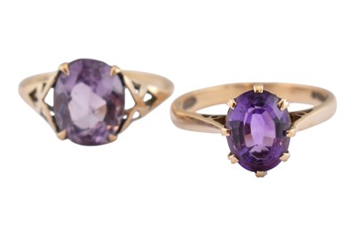 Lot 401 - TWO 9CT GOLD & AMETHYST SOLITAIRE RINGS