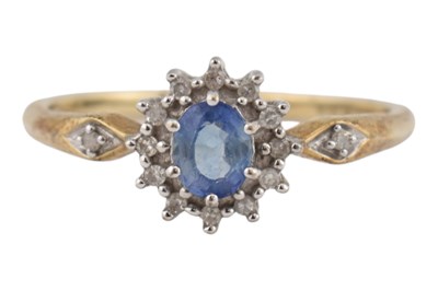 Lot 468 - HALLMARKED 9CT GOLD & SAPPHIRE HALO RING