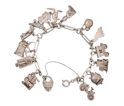 Lot 431 - A VINTAGE SILVER CHARM BRACELET