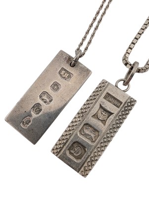 Lot 131 - TWO HALLMARKED SILVER INGOT PENDANT NECKLACES