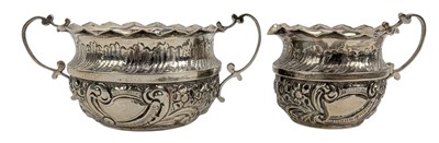 Lot 150 - VICTORIAN HALLMARKED SILVER REPOUSSE SUGAR BOWL & CREAMER JUG