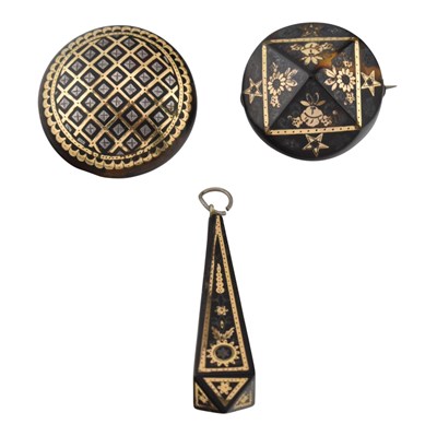 Lot 547 - TWO 19TH CENTURY TORTOISESHELL PIQUE WORK BROOCHES & A PENDANT