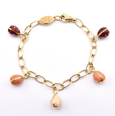 Lot 26 - FABERGÉ 18CT GOLD EGG CHARM BRACELET CASED