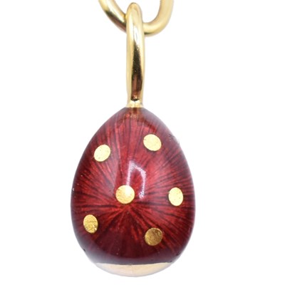Lot 26 - FABERGÉ 18CT GOLD EGG CHARM BRACELET CASED