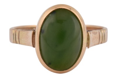Lot 239 - NEPHRITE CABOCHON RING