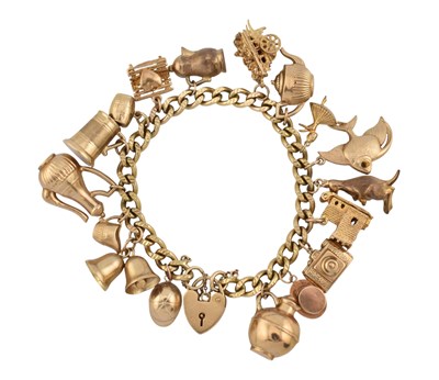 Lot 100 - 1970S HALLMARKED 9CT GOLD CHARM BRACELET & CHARMS