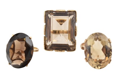Lot 459 - THREE HALLMARKED 9CT GOLD SMOKY QUARTZ COCKTAIL RINGS