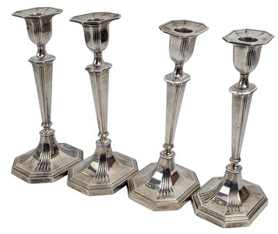 Lot 34 - FOUR EDWARD VII HALLMARKED SILVER CANDLESTICKS