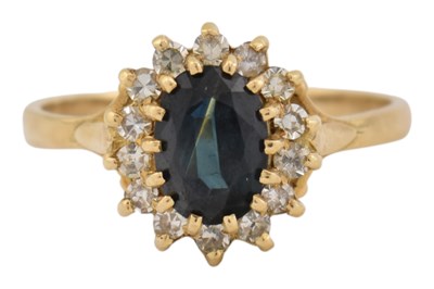 Lot 132 - 18CT GOLD SAPPHIRE & DIAMOND RING