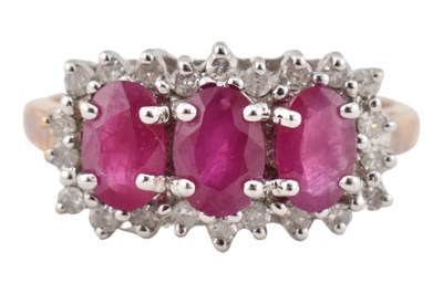 Lot 539 - HALLMARKED 9CT GOLD RUBY & DIAMOND THREE STONE RING