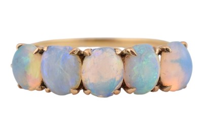Lot 543 - GOLD OPAL FIVE STONE CABOCHON RING