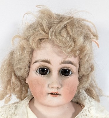 Lot 179 - DOLLS - AN ANTIQUE BISQUE HEADED DOLL WITH PULL STRING VOICE BOX
