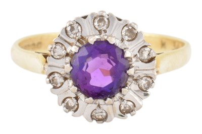 Lot 390 - HALLMARKED 18CT GOLD AMETHYST & DIAMOND CLUSTER RING