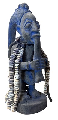 Lot 82 - NIGERIAN, YORUBA PEOPLE CARVED WOOD & BLUE PAINTED ESHU SHRINE FIGURE WITH SHELLS