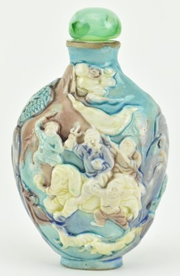 Lot 136 - PORCELAIN RELIEF FIGURINE SNUFF BOTTLE 雕瓷粉彩人物故事鼻烟壶