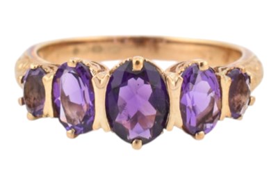 Lot 337 - HALLMARKED 9CT GOLD & AMETHYST FIVE STONE RING